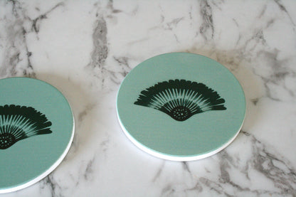 Två stycken Solfjäder underlägg närbild